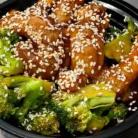 Sesame Chicken · Batter fried chicken cube in a homemade sauce and topped with sesame.