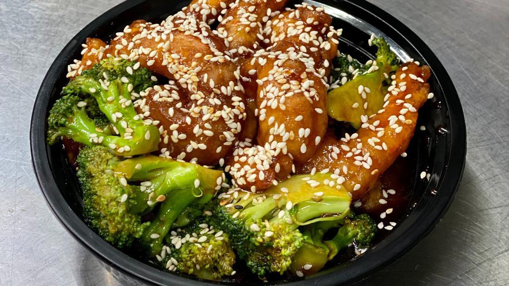 Sesame Chicken · Batter fried chicken cube in a homemade sauce and 
topped with sesame.