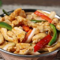 Chicken Chilli Onion · Stir fried chicken in a red chili sauce and green onion. Hot and spicy.