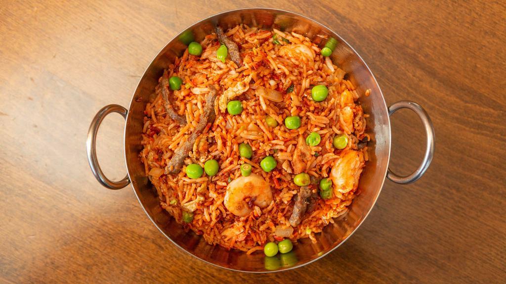 Mix Masala Fried Rice · Basmati rice stir-fried with masala. Hot and spicy with a mix of proteins.