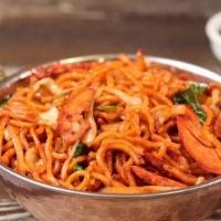 Chicken Masala Chow Mein · Chinese noodles stir-fried, flavored with Indian masala. Hot and spicy.