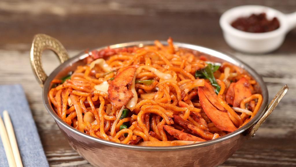 Chicken Masala Chow Mein · Chinese noodles stir-fried, flavored with Indian masala. Hot and spicy.