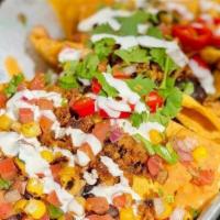Beyond Nacho Platter · Spicy. Fresh made tortilla chips topped with cooked Beyond seasoned meat, pico de gallo, veg...