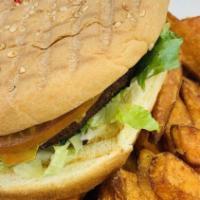 Fish Fillet · Good Catch fish patty, tartar sauce, pickles, lettuce, cheese on a toasted bun served with f...