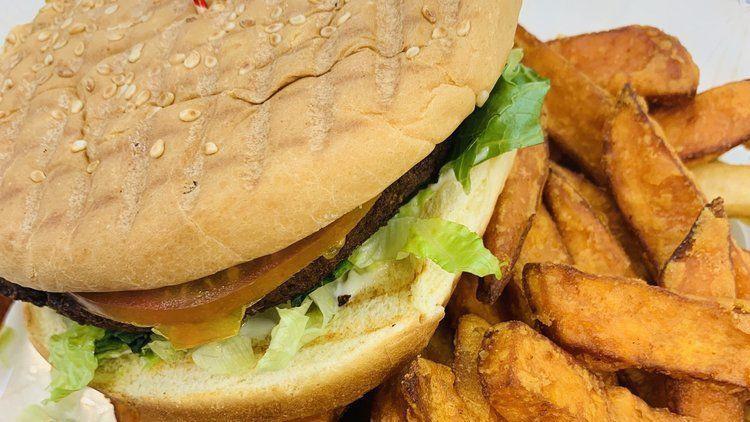Fish Fillet · Good Catch fish patty, tartar sauce, pickles, lettuce, cheese on a toasted bun served with fries.