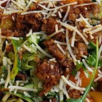 Blt Avocado Salad · Mixed greens, tomato, onions, crispy bacon bits, and avocado.