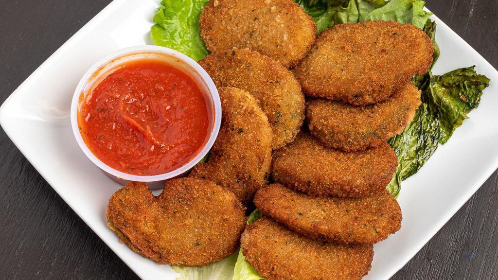 Fried Zucchini Chips · Served with tomato sauce.