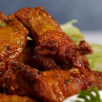 Buffalo Wings · Tangy and spicy , blue cheese dipping, celery sticks.
