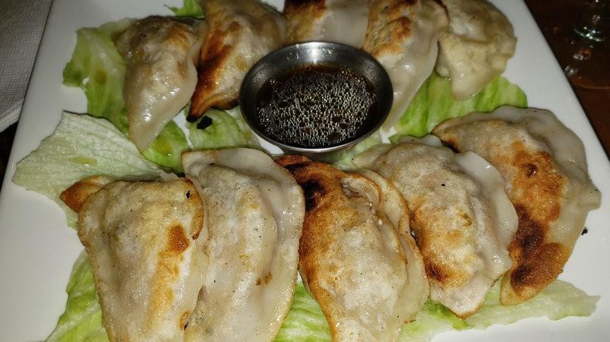 Pork & Shrimp Dumplings · ginger cilantro soy dipping.