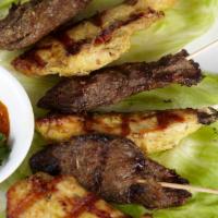 Chicken  Satay · grilled with peanut dipping sauce.