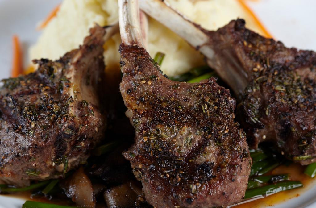 New Zealand Lamb Chops · grilled with herb seasoning, shiitake and bok choy stir fry.