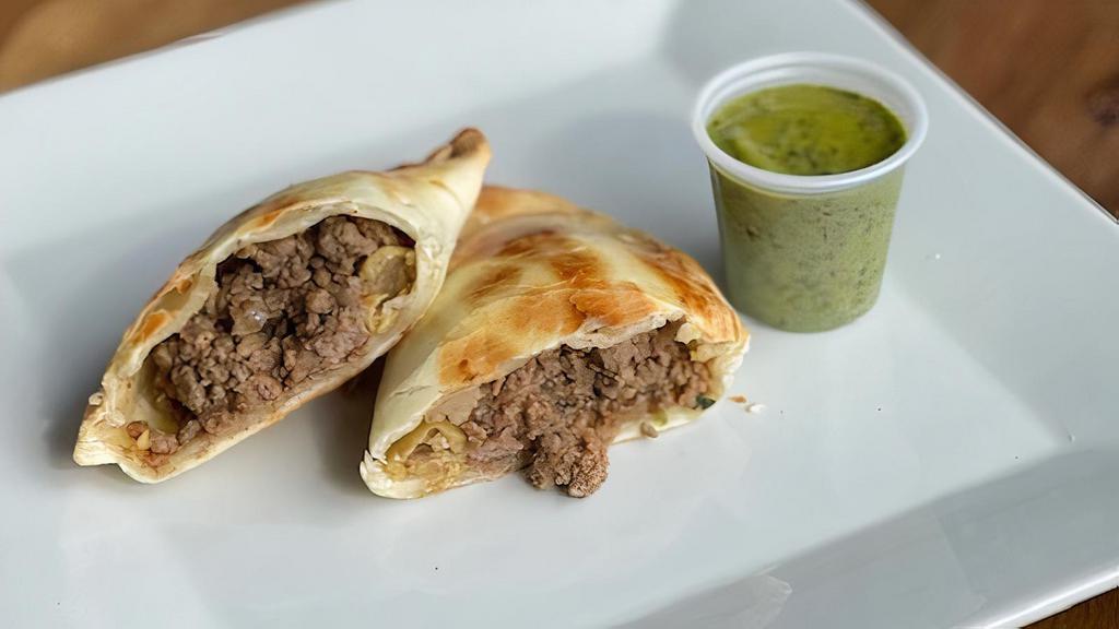 3  Beef Empanadas  · ground beef, hard-boiled egg, onions, green olives and spices