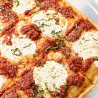 Grandma Square Pizza · Plum tomato sauce, fresh mozzarella, basil, parmesan cheese, oregano, EVOO.