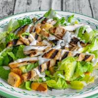 Caesar Salad · Romaine lettuce, croutons, shaved parm, parmesan cheese