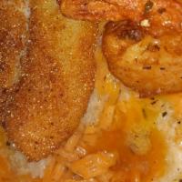 Fish(Haddock) & Shrimp With Grits · Haddock choice of butter garlic parm, lemon pepper or cajun.