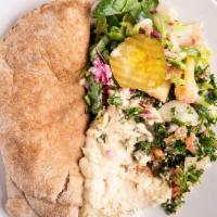 Hummus (+ Tabouli) - Platter · Served on a bed of rice, salad, or both, plus olives, peppers, and one sauce.  Comes with a ...