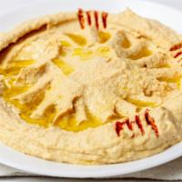 Hummus · Hummus is a Middle Eastern dip, spread, or savory dish made from cooked, mashed chickpeas bl...