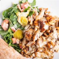Chicken Shawarma Plate · Every plate comes with Rice, Vegetables, Pita Bread and One Side.