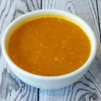 Curried Butternut Squash Soup · Roasted butternut squash, curry spices, ginger, lemon, coconut milk
