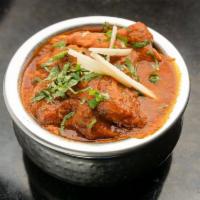 Chicken Curry Baby Spinach · Traditional Punjabi Chicken curry, baby spinach, Garam masala.