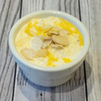 Saffron Kheer · Indian Rice Pudding. Served Chilled, flavored with saffron & cardamom