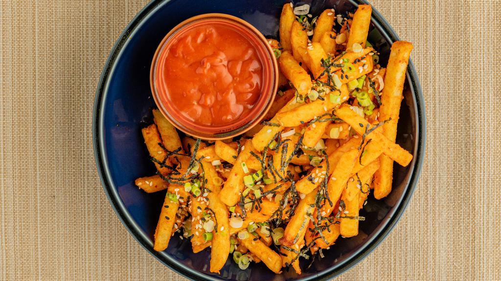 Kimchi Fries · Fries tossed in Kimchi Sauce, Sesame seeds, Nori and Scallions with Spicy Ketchup