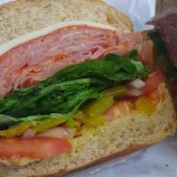 Ultimate Italian · Cappy ham, Genoa salami, Provolone, Pepperoni,
lettuce, tomato & dressing .