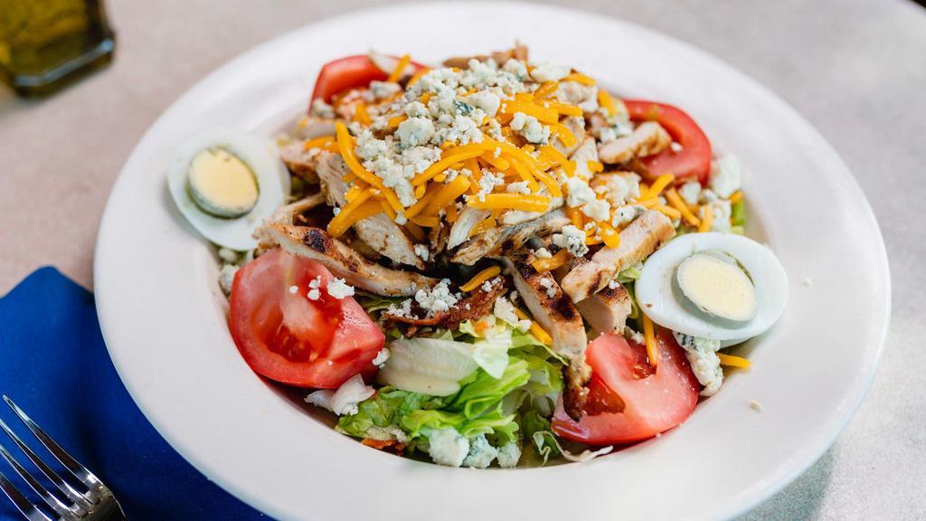 Cobb Salad · Grilled Chicken, Crumbled Blue Cheese, Tomato, Bacon, Hard Boiled Egg and Mixed Shredded Cheeses