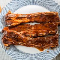 Beef Ribs · Marinated to the Bone! These Flanken Style short ribs take BBQ to the next level! Grilled to...