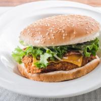 Zesty Chicken Sandwich Solo · Boneless Chicken Breast, Never Frozen and Seasoned, Fried or Grilled topped off with Cheese,...