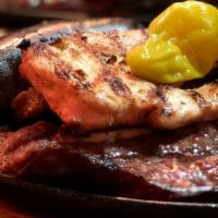 Parrillada For 2 · Mixed plate of grilled short rib, skirt steak, blood sausage, chorizo, chicken, Argentine ch...
