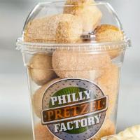 Cinnamon Rivet Shaker · Our bite-size pretzel nuggets covered in a cinnamon sugar blend. You might have a hard time ...