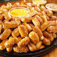 Large Rivet Party Tray · Pair your large size rivets party tray with any three of our wide assortment of pretzel dips...