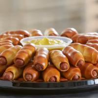 All Mini Dogs Party Tray · An all-American classic done Philly Pretzel style! 72 all beef mini pretzel dogs with americ...