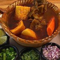 Sopa De Res (Beef Soup) · Beef soup with vegetables served with tortillas and rice.