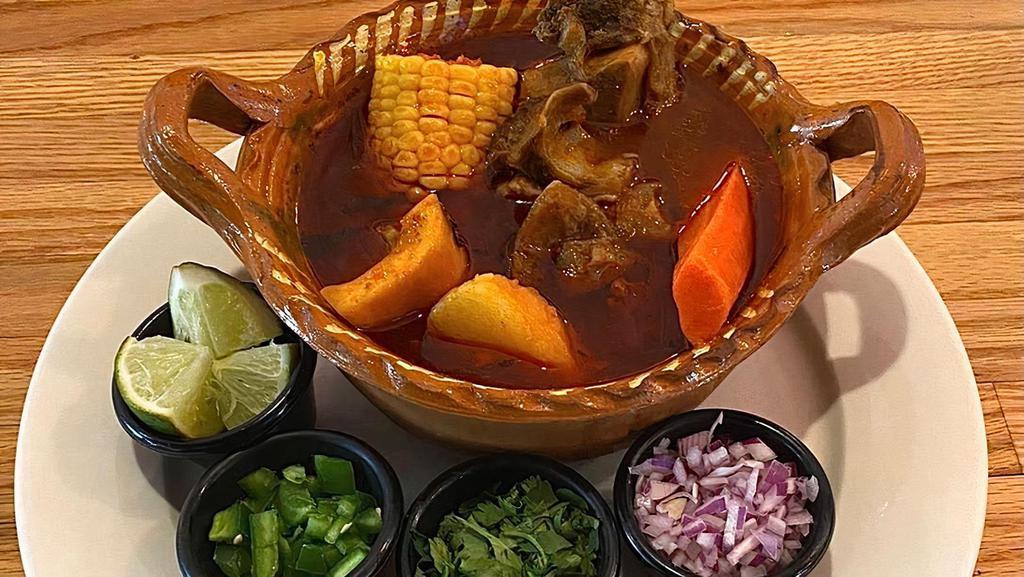Sopa De Res (Beef Soup) · Beef soup with vegetables served with tortillas and rice.