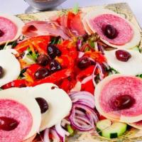 Antipasto Napolitano · Served with the finest meats, cheeses, imported prosiutto, salami, capicola, provolone, fres...