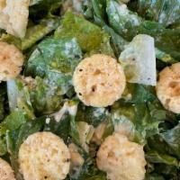 Caesar Salad · black pepper, olive oil, parmesan crisp