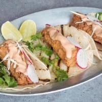Wild Fish Taco · celery remoulade, lime, chipotle aioli