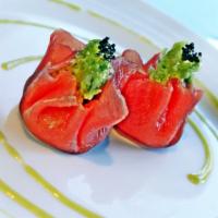 Tuna Wasabi Dumpling · Wasabi tobiko, avocado, tossed with a crunch.

Menu items consist of or contain meat, fish, ...