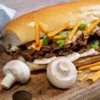 Mushroom Philly Cheesesteak · Delicious, juicy cheesesteak sandwich with mushrooms, peppers and onions.