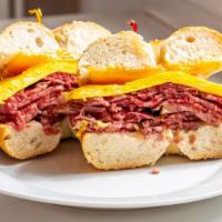 Meat Egg & Cheese · Bagel, pastrami, corned beef or bacon, scrambled eggs, cheddar.