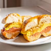 Lox, Eggs, Onions · Bagel, hand sliced nova lox, scrambled eggs, caramelized onions.