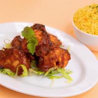 Chicken Tikka Kebab (7 Pcs.) · Boneless chicken breast marinated with ginger-garlic paste, lime juice, yoghurt, ‘inhouse’ g...