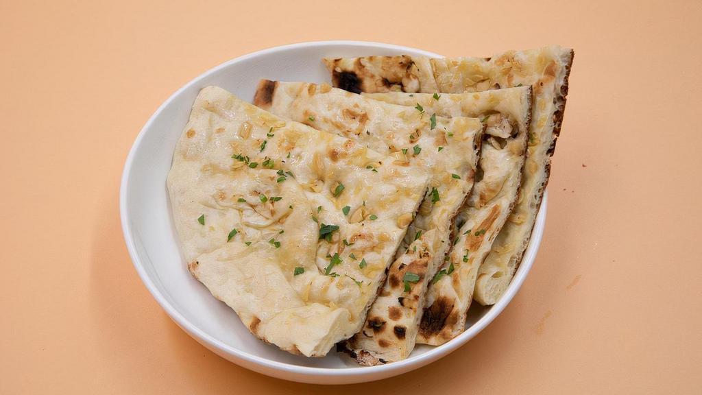 Garlic Naan · This flat-bread has a smoky flavor from roasted garlic, mashed and mixed with the. dough