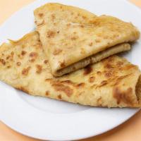 Parata · Another popular flat-bread. Round in shape and fried with ghee (clarifying butter) for richn...