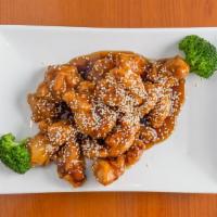 Sesame Chicken · The chunk of chicken marinated with sesame seed in a special sauce. with white rice.