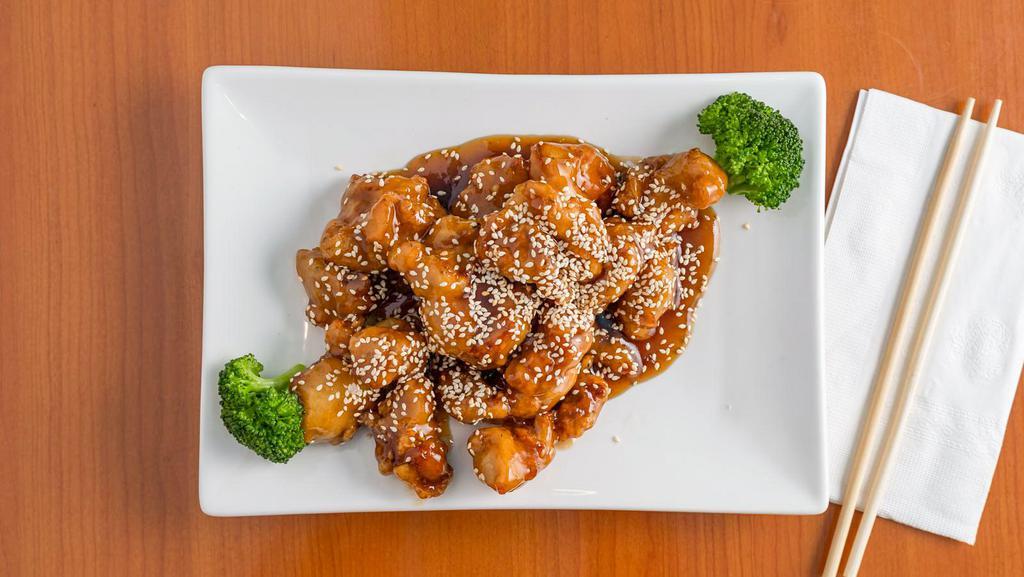 Sesame Chicken · Deep-fried chunk breaded chicken cooked in an exquisite sesame sauce served with sesame seeds.