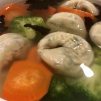 Wonton Soup · Delightful wontons with fresh mushrooms, carrots, broccoli, seaweed.