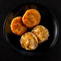 P4 Potstickers - Beef · Golden crusted pan-fried dot dumplings,  beef fillings.